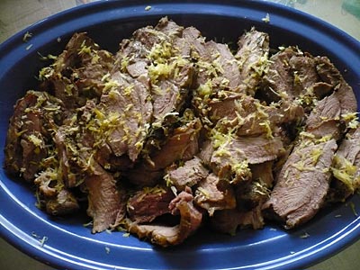 bbq lamb leg carved Before serving pour lemon juice and zest over the meat