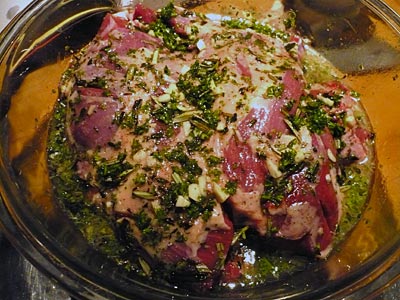 The butterflied lamb leg in the Greek marinade